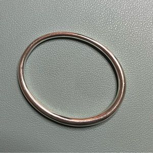 Simple Tapered Bangle from Kate Jones jewelry Ursa Major. Solid sterling silver.